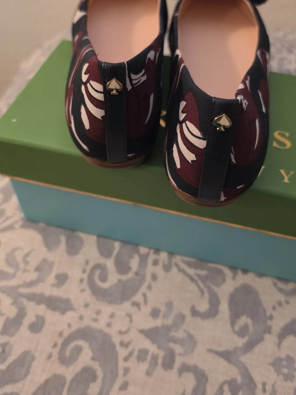 kate spade Floral Patterned Pointed Toe Flats with Black Pom-Poms